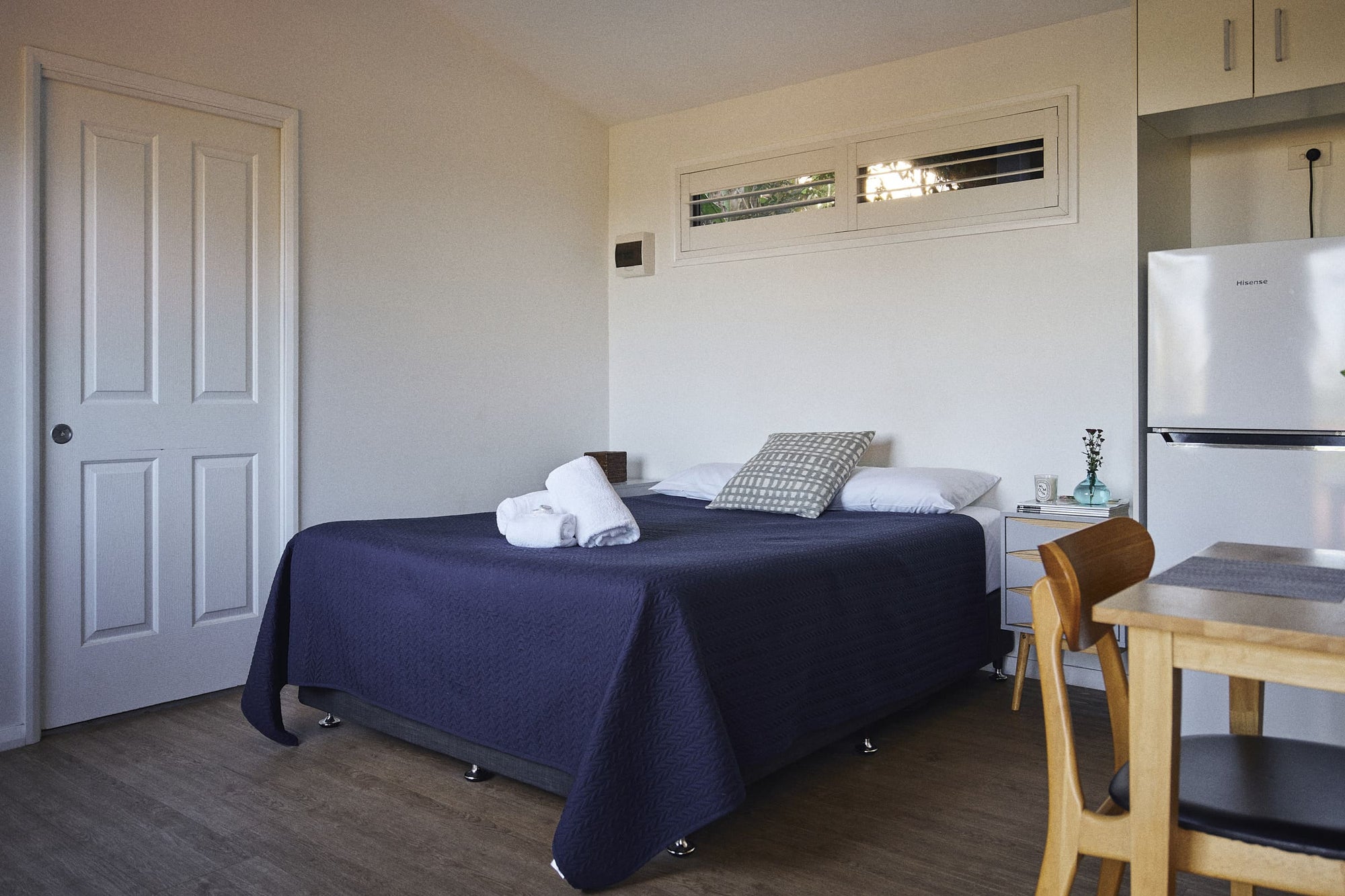 Queen bed in Brooman Cabin.