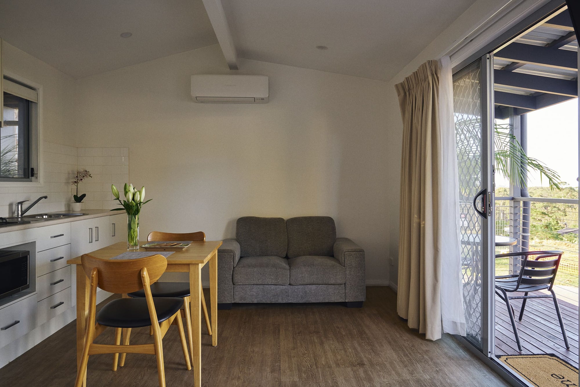 Kitchenette, dining and living area in Brooman Cabin.