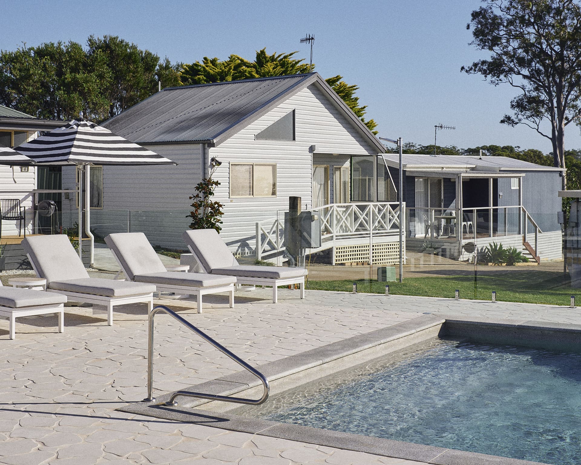 Poolside view of the renovated swimming pool at The Mook Mollymook.
