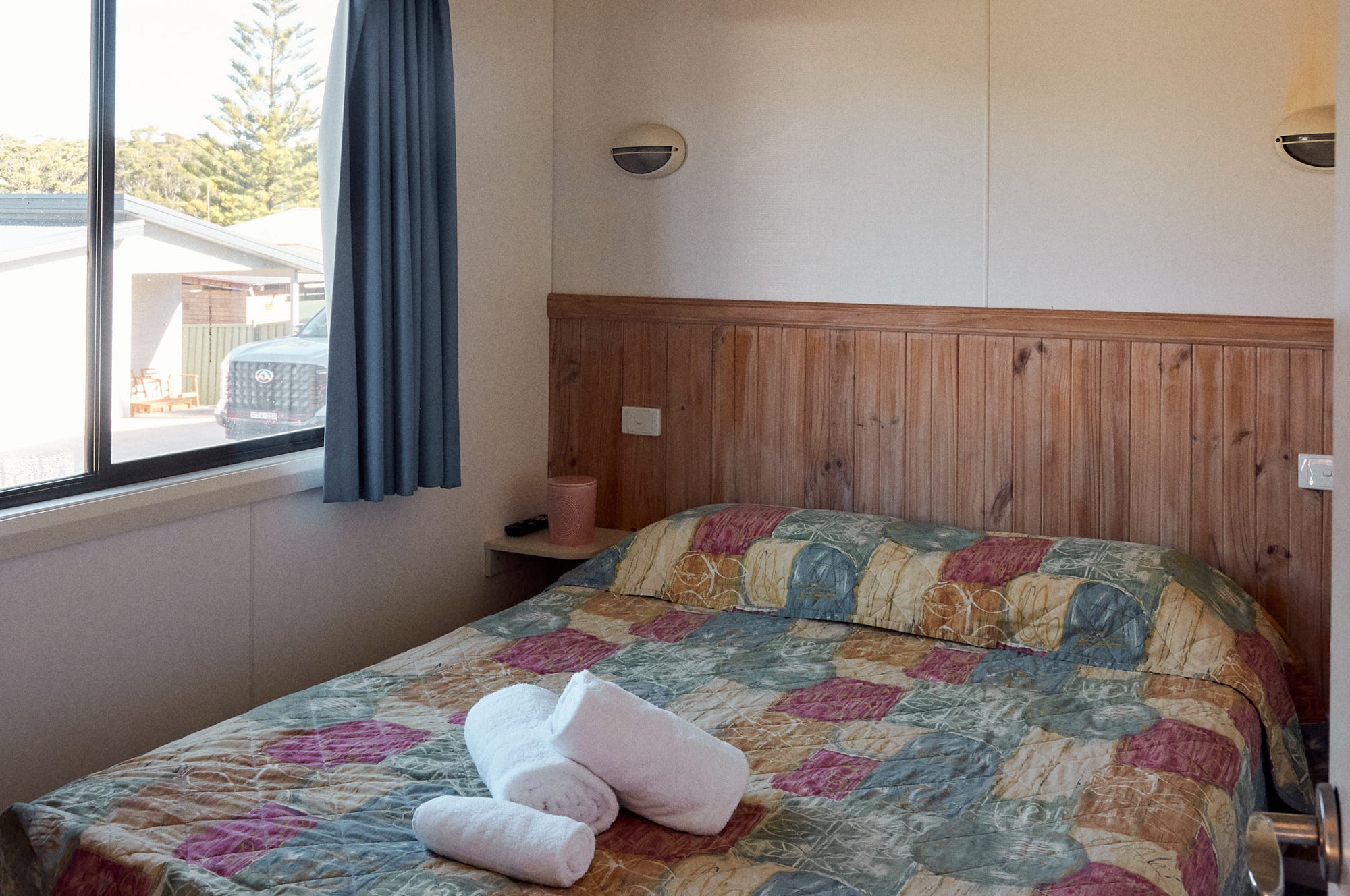 Main bedroom with queen bed in Jerrawangala Cabin.