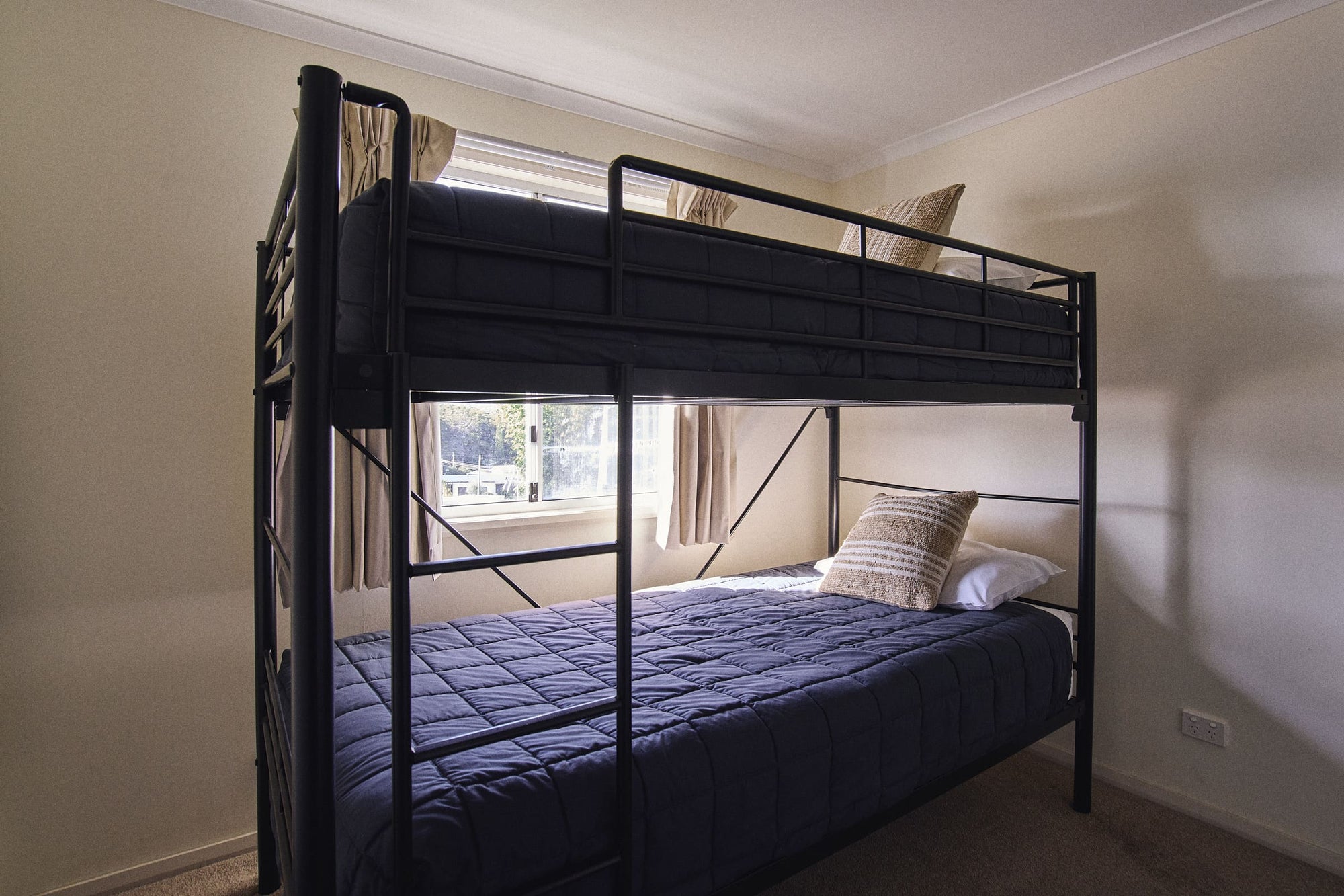 Second bedroom with a set of single bunk beds in Meroo House.
