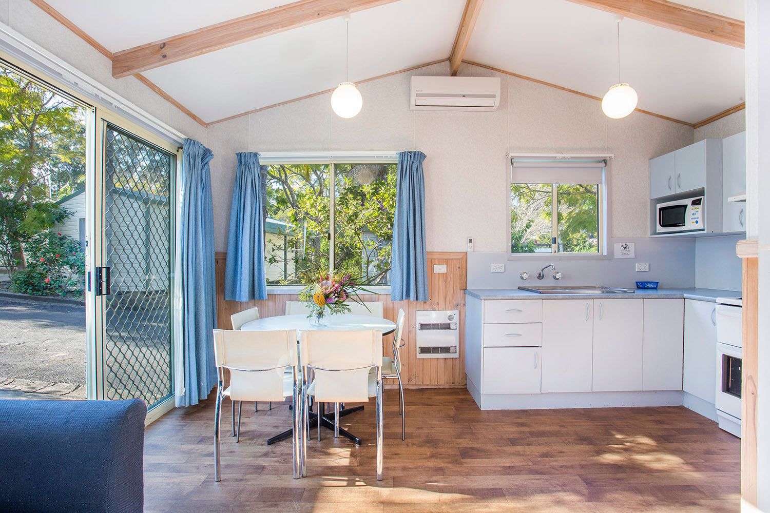 Open-plan living area in Yerriyong A Cabin.