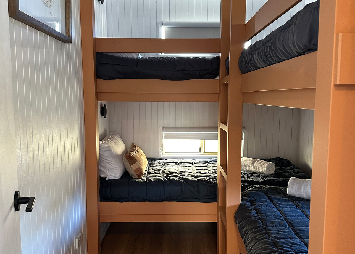 Second bedroom with 2 sets of bunk beds in Yerriyong Cabin 4A.
