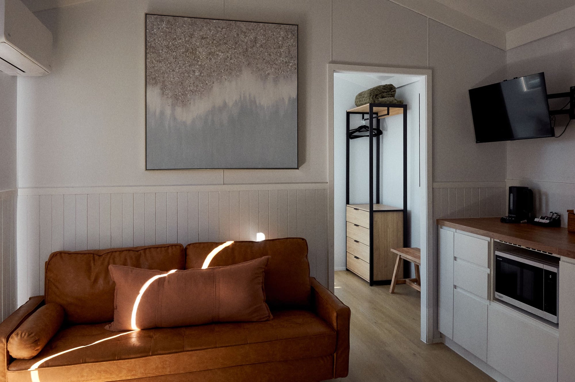 Open-plan living area in Yerriyong B Cabin.