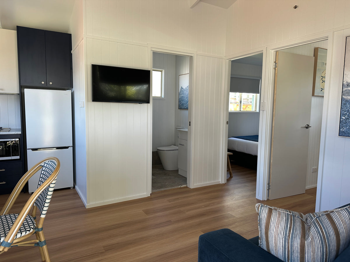 Open-plan living area in Yerriyong C Cabin.
