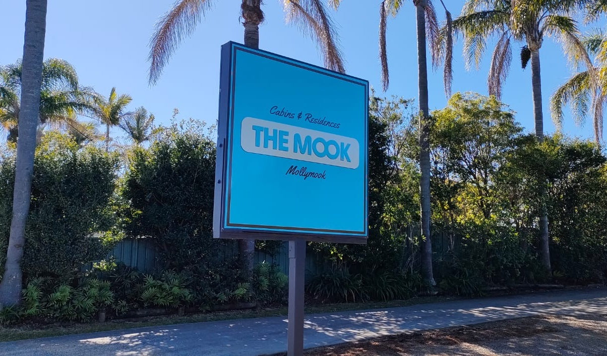 Modern entrance sign to The Mook Mollymook following the park's transformation.
