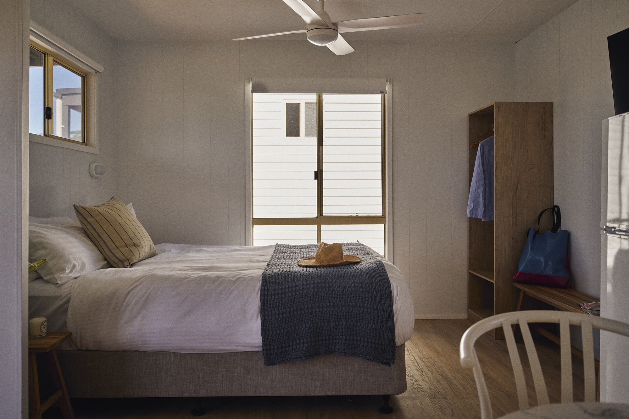 Main bedroom with bed in Clyde C Cabin.