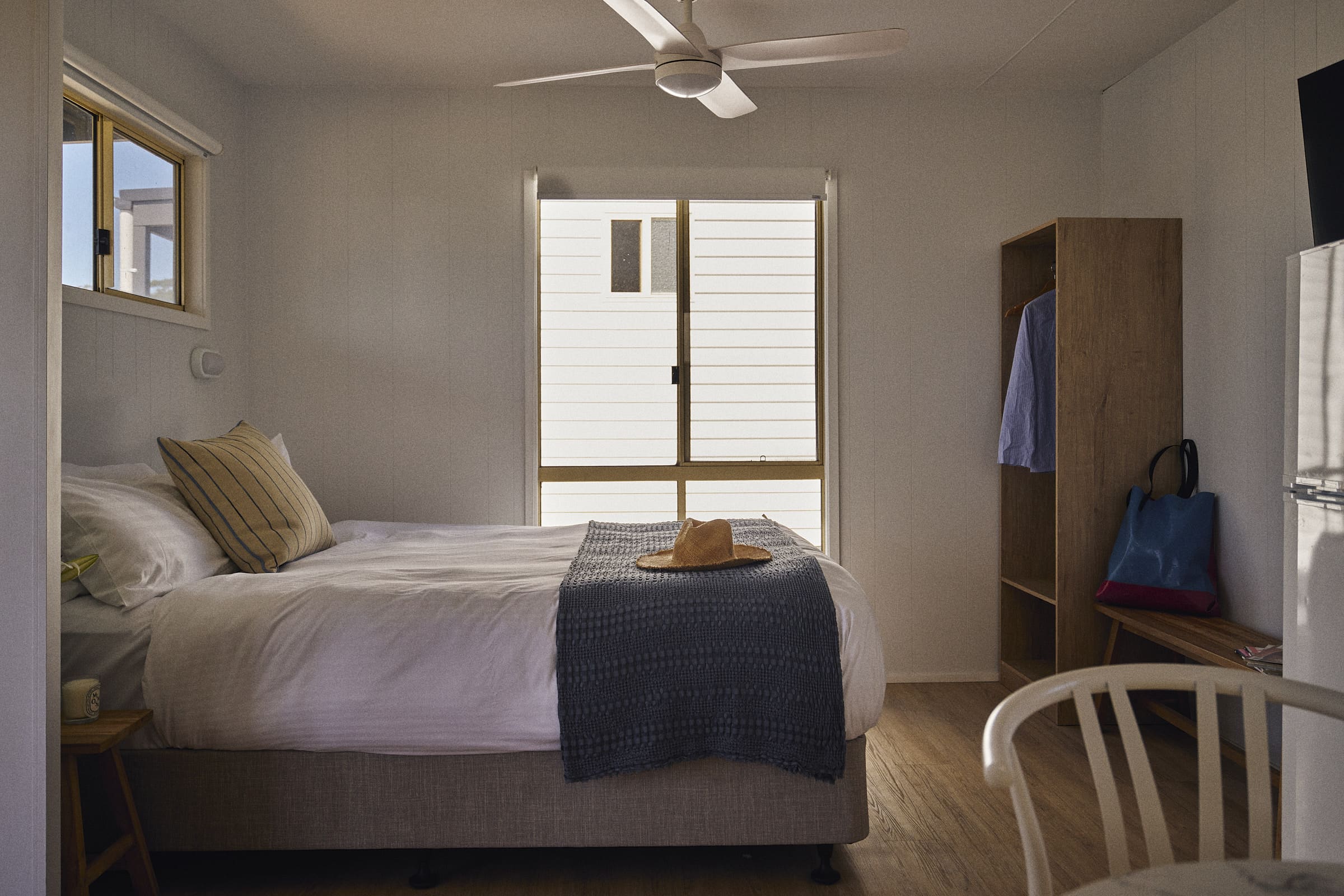Main bedroom with bed in Clyde C Cabin.