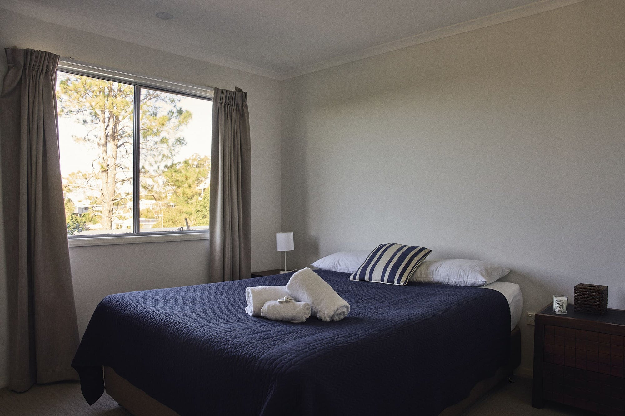 Main bedroom with queen bed in Currowan House.