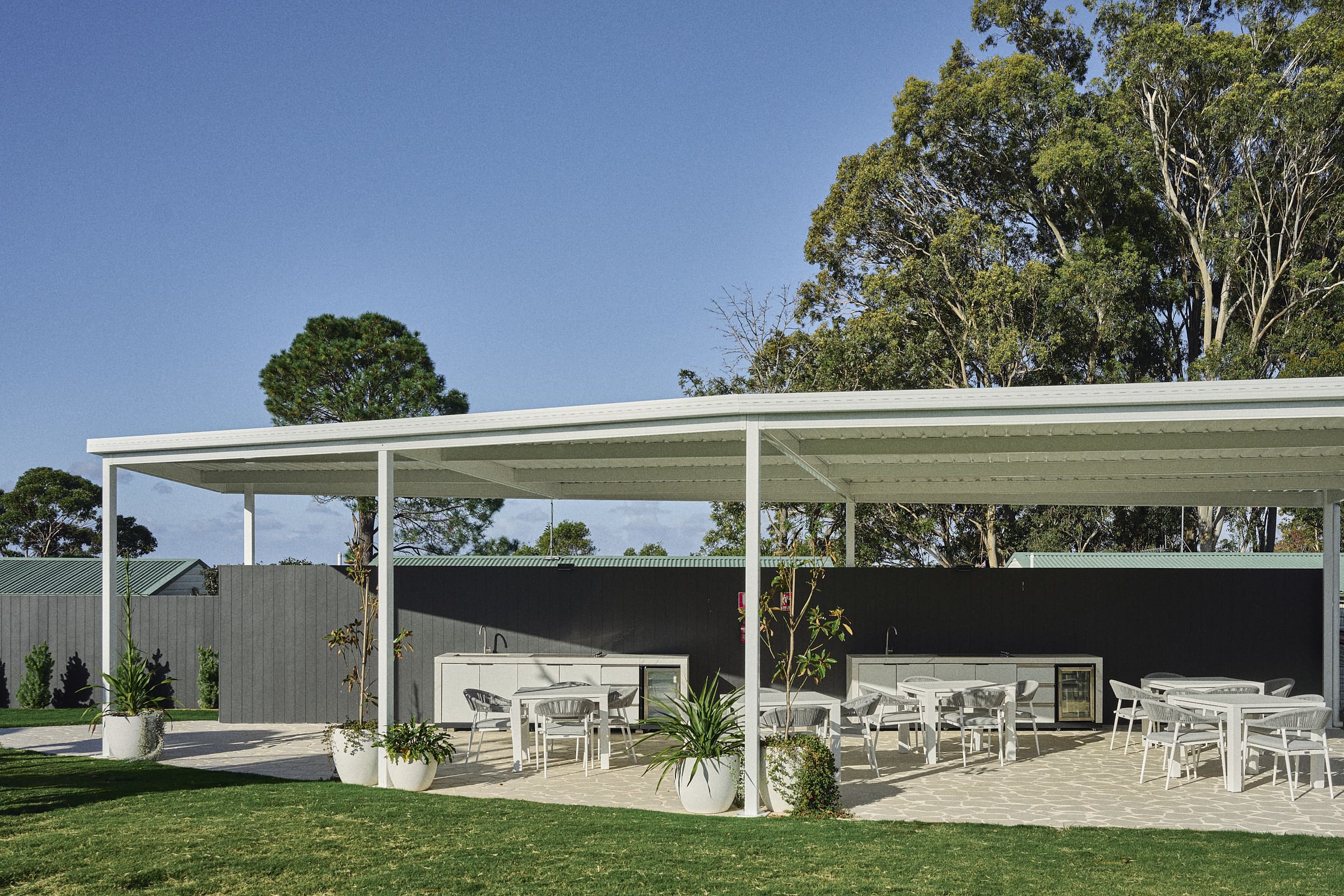 Covered BBQ area with seating at The Mook Mollymook.