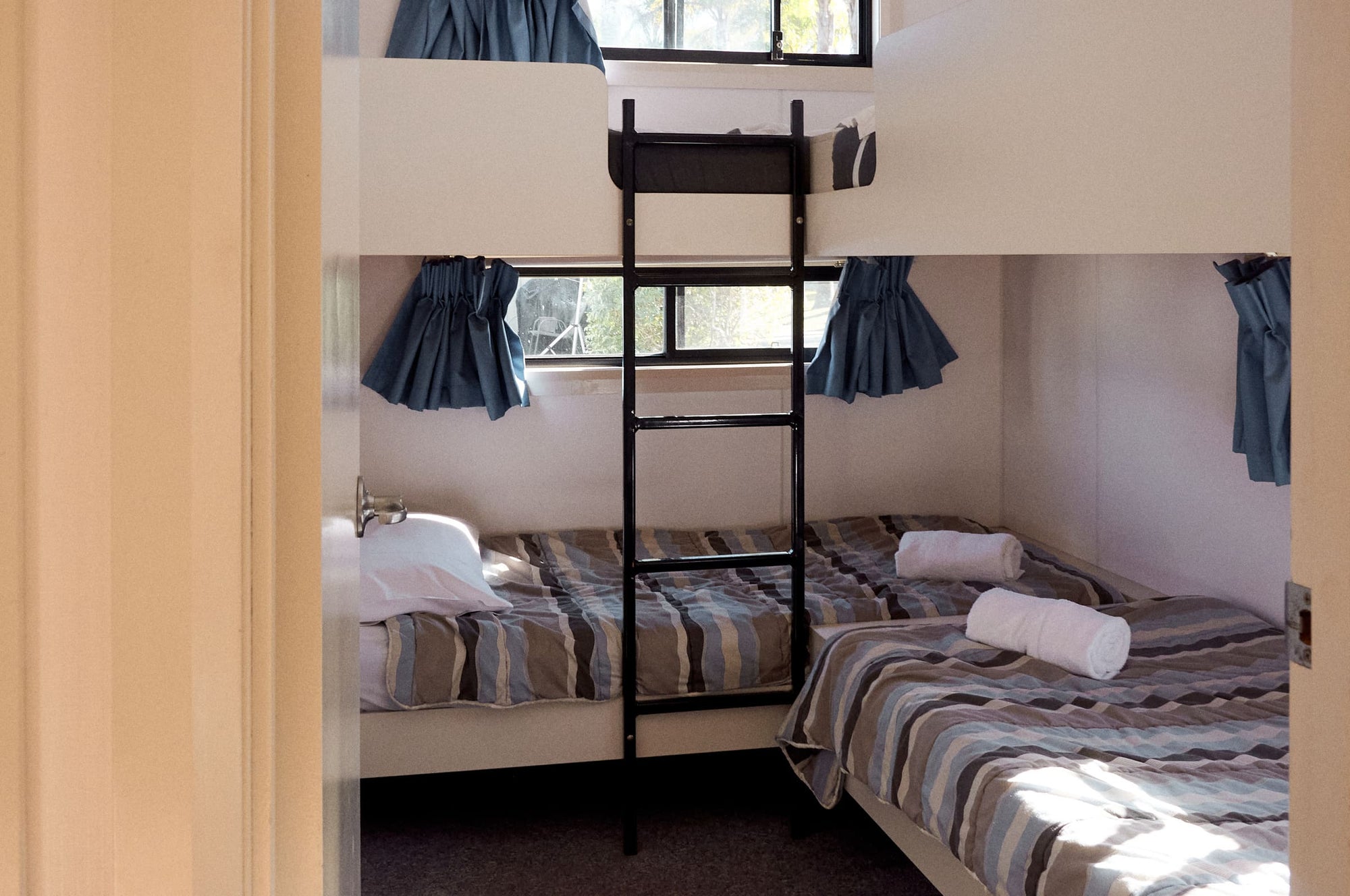 Second bedroom with two sets of single bunk beds in Jerrawangala Cabin.