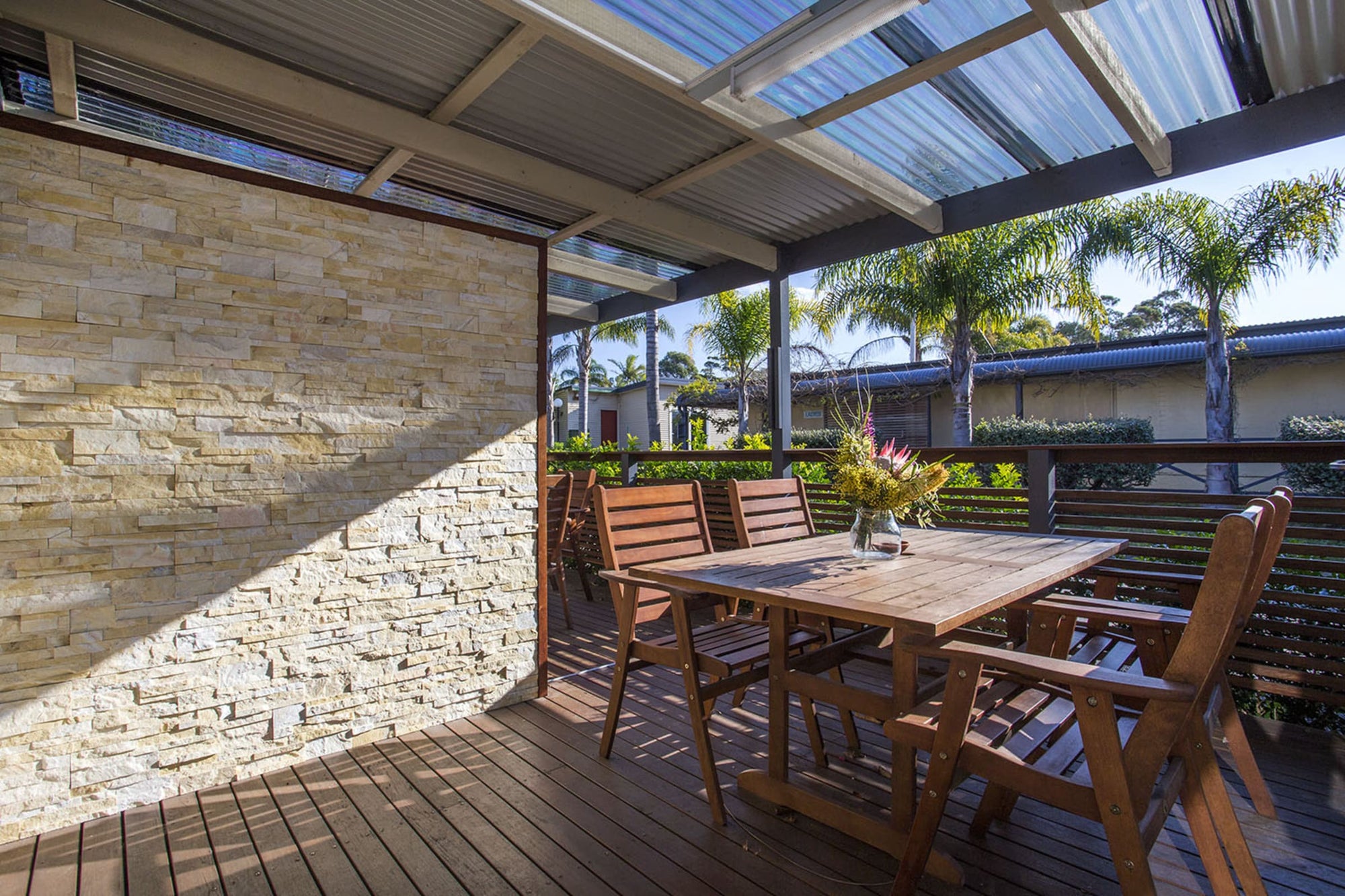 Covered outdoor dining area at Jerrawangala Cabin.