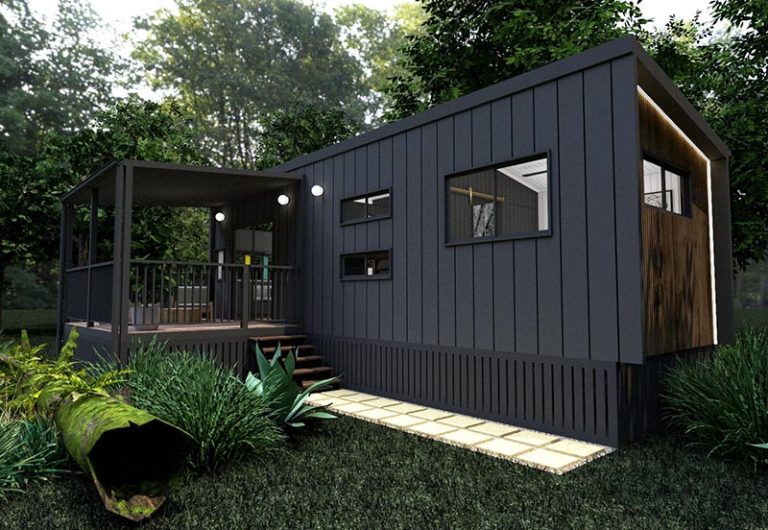 Pebbly Tiny Homes Cabin exterior with covered outdoor seating.