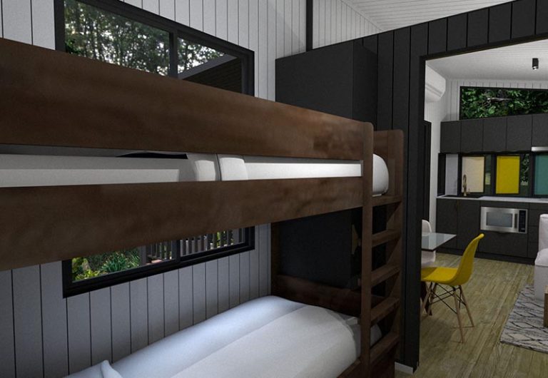 Second bedroom with set of single bunk beds in Pebbly Tiny Homes Cabin.