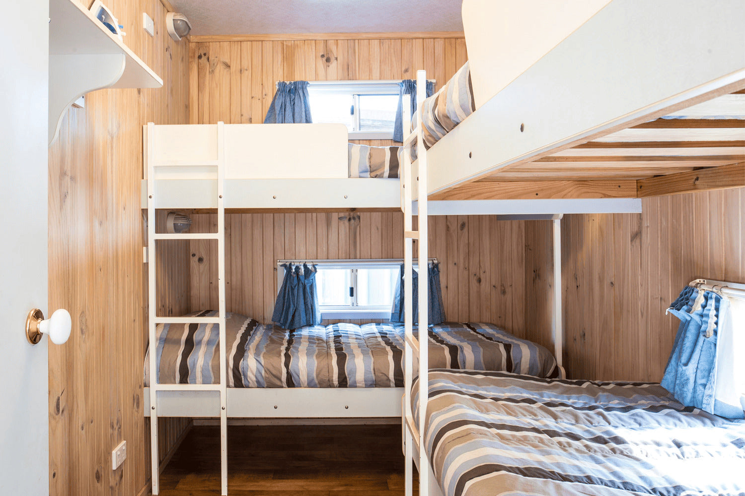 Second bedroom with two sets of single bunk beds in Yerriyong A Cabin.