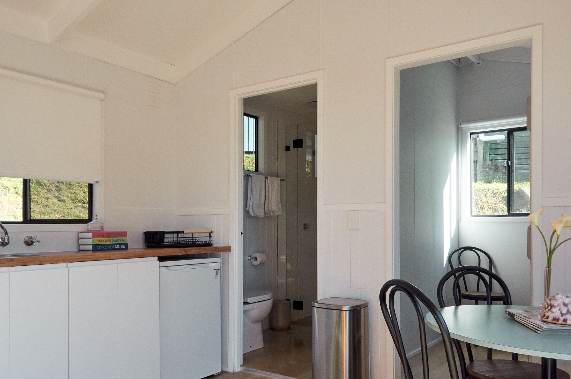 Modern kitchenette and table in Yerriyong B Cabin.
