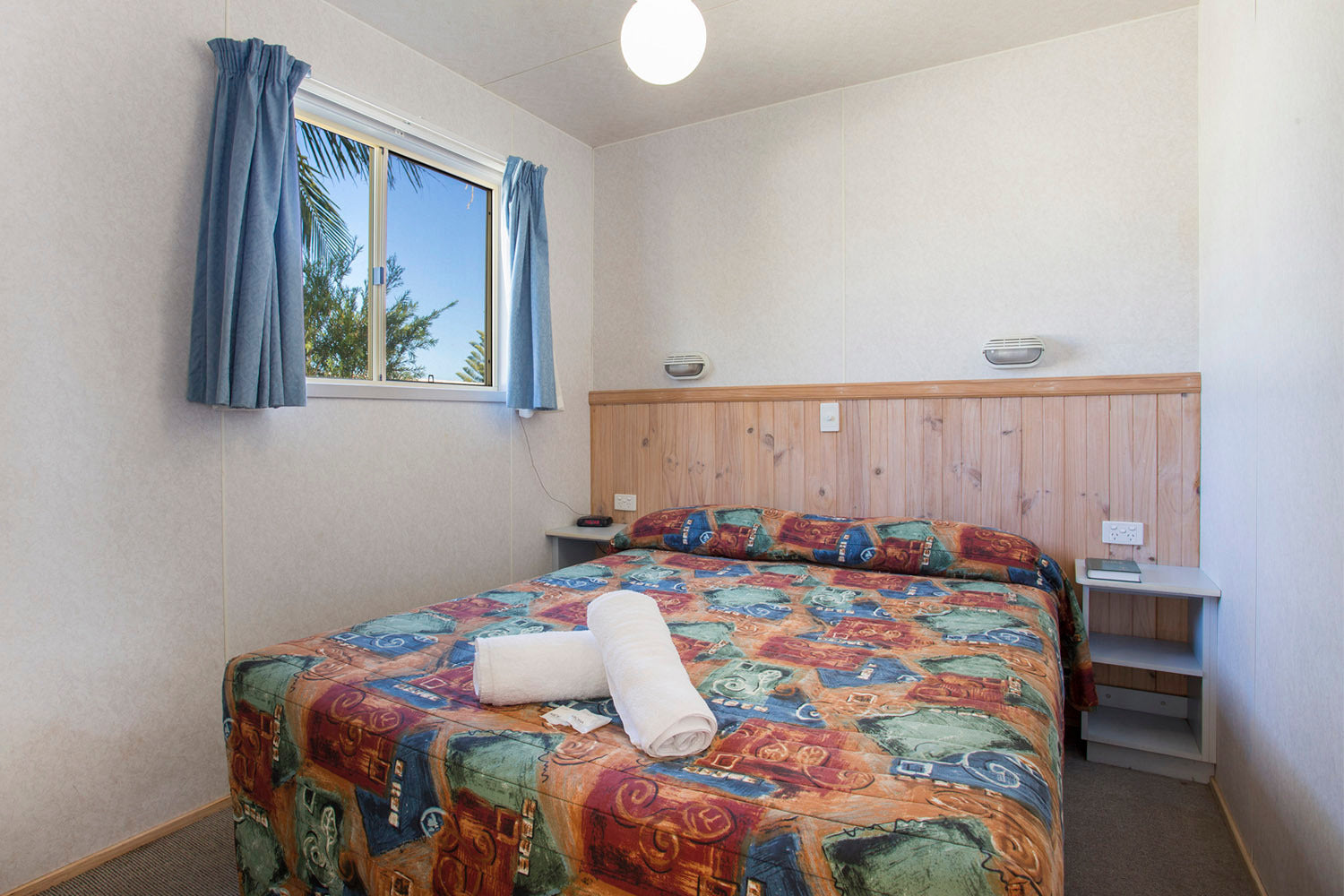 Main bedroom with queen bed in Yerriyong C Cabin.