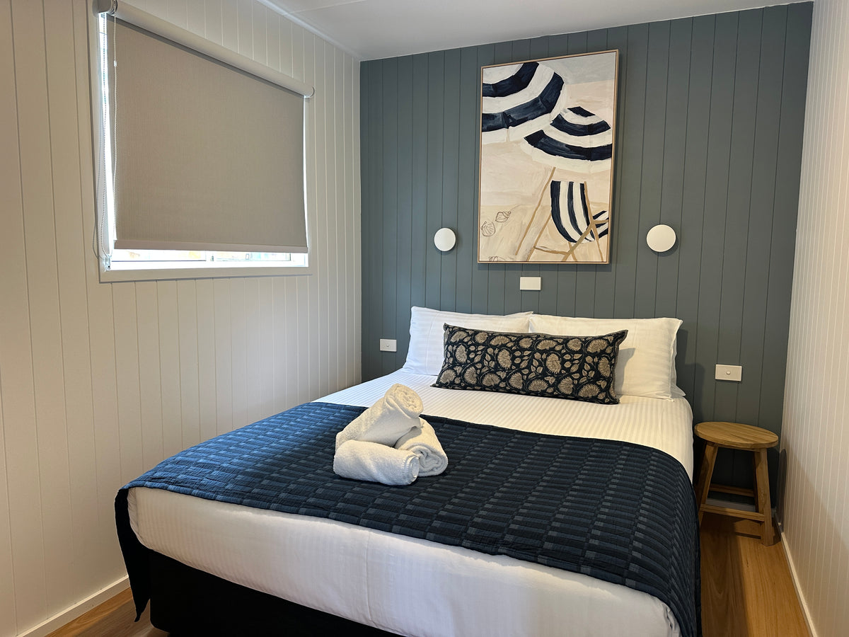 Main bedroom with queen bed in Yerriyong C Cabin.